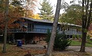 Decca design, two-level rectangular house with gable roof that was similar to Goodman's design for the No. 2 two-level unit type.