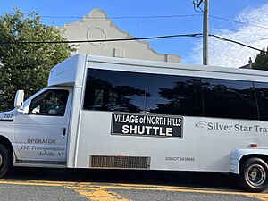 Village of North Hills Shuttle Bus on Northern Boulevard, Manhasset, NY August 23, 2023