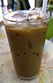 A glass of Ipoh iced white coffee