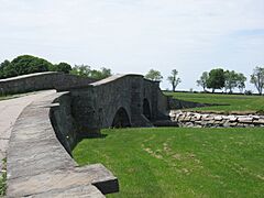 A stone bridge in Colt State Park