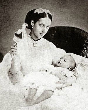 Alexandra with her first born child Albert Victor