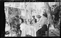 Francis Picabia and F.M. Mansfield with 2 women and a man at outdoor café table. Cassis, France