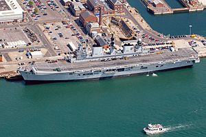 HMS Illustrious along side in Portsmouth Naval Base. MOD 45144951