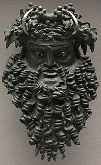 Mascherone di dioniso in bronzo, già attacco di un manico in una situla o simile, 200-100 ac. ca