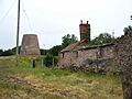 Old windmill and derelict buildings - geograph.org.uk - 191702