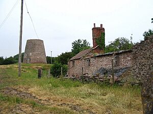 Old windmill and derelict buildings - geograph.org.uk - 191702