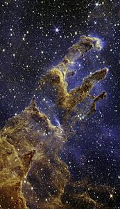 The Pillars of Creation are set off in a kaleidoscope of color in NASA’s James Webb Space Telescope near-infrared-light view.