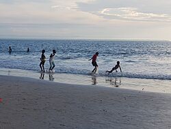 Playing by the coastline in Libreville