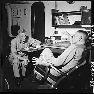 Vadm. John S. McCain (left) and Adm. William F. Halsey, Com. 3rd Flt., hold conference on board USS New Jersey... - NARA - 520890