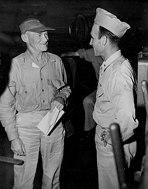 Admiral Mitscher speaking with David McCampbell