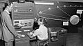 Human computer with IBM 704 in 1959