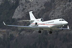 Monaco Government Dassault Falcon 7X on finals into Innsbruck