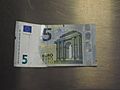 5 Euro note in bad condition