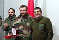 Arayik Harutyunyan awarding a volunteer on November 2 2020