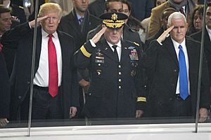 Donald J. Trump, Mark A. Milley and Mike Pence salute, Jan. 20, 2017