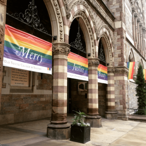 Mercy, Justice, Beauty - LGBTQ+ banners at Old South Church, Boston, MA, USA