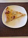 Pizza quattro formaggi at restaurant in Chernihiv