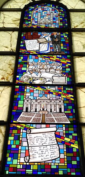 Stained glass depiction of key moments in the lifetime of Mother Teresa at the Cathedral of Saint Mother Teresa in Prishtina
