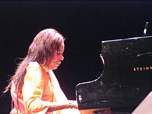 Coltrane playing piano
