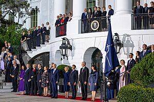 President Joe Biden salutes as the Army Fife and Drum Corps performs a “Troop in Review” during an official arrival ceremony with NATO leaders and their spouses on July 10, 2024 at the White House
