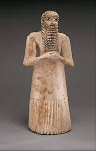 Standing male worshiper MET DT850