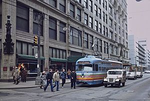 Trolley car passing downtown Pittsburgh Kaufmann's store, 1984.jpg