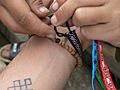 Tying friendship bracelet