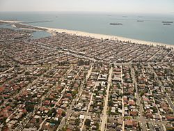 The Belmont Shore neighborhood of Long Beach, California in the upper-middle of this image, with the Belmont Heights neighborhood in the lower half, looking southeast. 2nd Street cuts diagonally across the left of this image.
