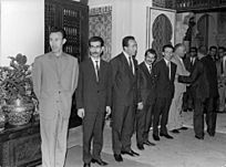 Houari-Boumediene-standing-in-a-row-with-the-other-politicians-391852507172