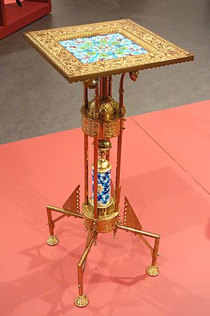 Stand by Bradley & Hubbard Manufacturing Co. (Meriden CT), with Longwy ceramic inserts (Meurthe-et-Moselle, France), c. 1885, brass, glazed earthenware - Brooklyn Museum - Brooklyn, NY - DSC08803