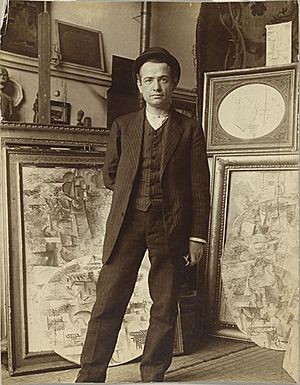 Auguste Herbin in Pablo Picasso’s studio on Boulevard de Clichy, early 1911.jpg