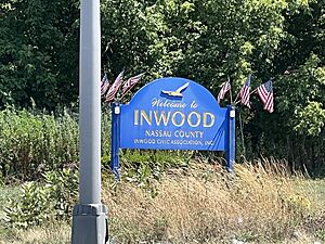 An Inwood welcome sign on the Nassau Expressway in August 2022.