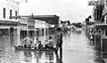 Photographers in boat after Hurricane Dora - Live Oak