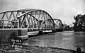 StateLibQld 1 43711 Floodwaters rush under the MacIntyre River Bridge, Goondiwindi, 1921