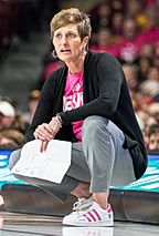 Teri Moren kneeling at courtside, 2020
