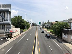 2021-07-15 11 02 21 View west along U.S. Route 30 and north along U.S. Route 130 (Crescent Boulevard) from the overpass for the rail line between the White Horse Pike and Haddon Avenue in Collingswood, Camden County, New Jersey
