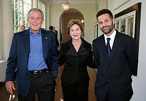 George and Laura Bush with Khaled Hosseini in 2007