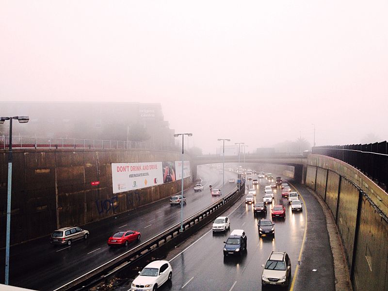 Traffic in the midst of the rain and fog