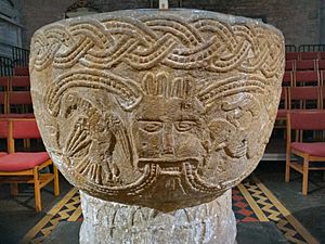 Brecon Cathedral Font with bird, Green Man and scorpion