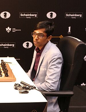 Fabiano Caruana - R Praggnanandhaa, Candidates Tournament 2024 02 (cropped).jpg