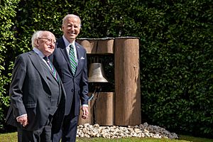 President Joe Biden stands with President Michael Higgins of Ireland