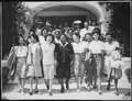 "Hattie McDaniel (center), Chairman of the Negro Division of the Hollywood Victory Committee, takes time off from rehear - NARA - 535875