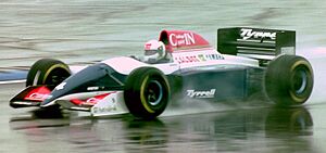 Andrea de Cesaris - Tyrrell 021 during practice for the 1993 British Grand Prix (33302878150) (cropped).jpg