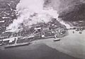 Brunei Town under Allied attack (AWM P00956.056)