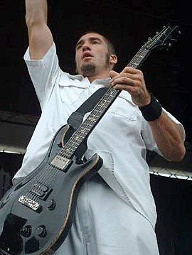 Clint Lowery performing in 1998 as Sevendust guitarist