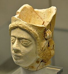 Drinking vessel in the shape of a woman's head. From Assur, Iraq. 1500-1200 BCE. British Museum