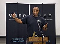 Francis speaking at Uber Event