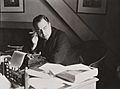 J B Priestley at work in his study, 1940. (7893553148)