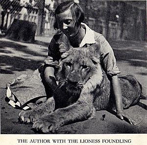 Vera Chaplina with the lioness Kinuli (Foundling). The Moscow Zoo, 1936