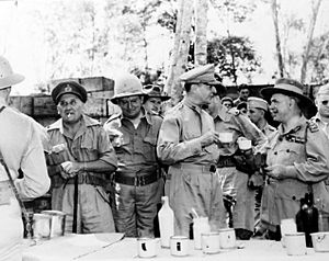 150836 McArthur and Blamey having tea during an inspection Port Moresby